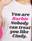 BARBIE White Y Day Apparel T-shirt with fun affirmation foodie slogan on the front: You are Barbie Nobody can treat you like Cindy in ORANGE font. It’s celebrates self worthiness. Available to Purchase from Y Day Apparel.com